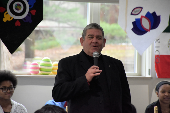 Fr. Scott addressing the kids and coworkers on Easter