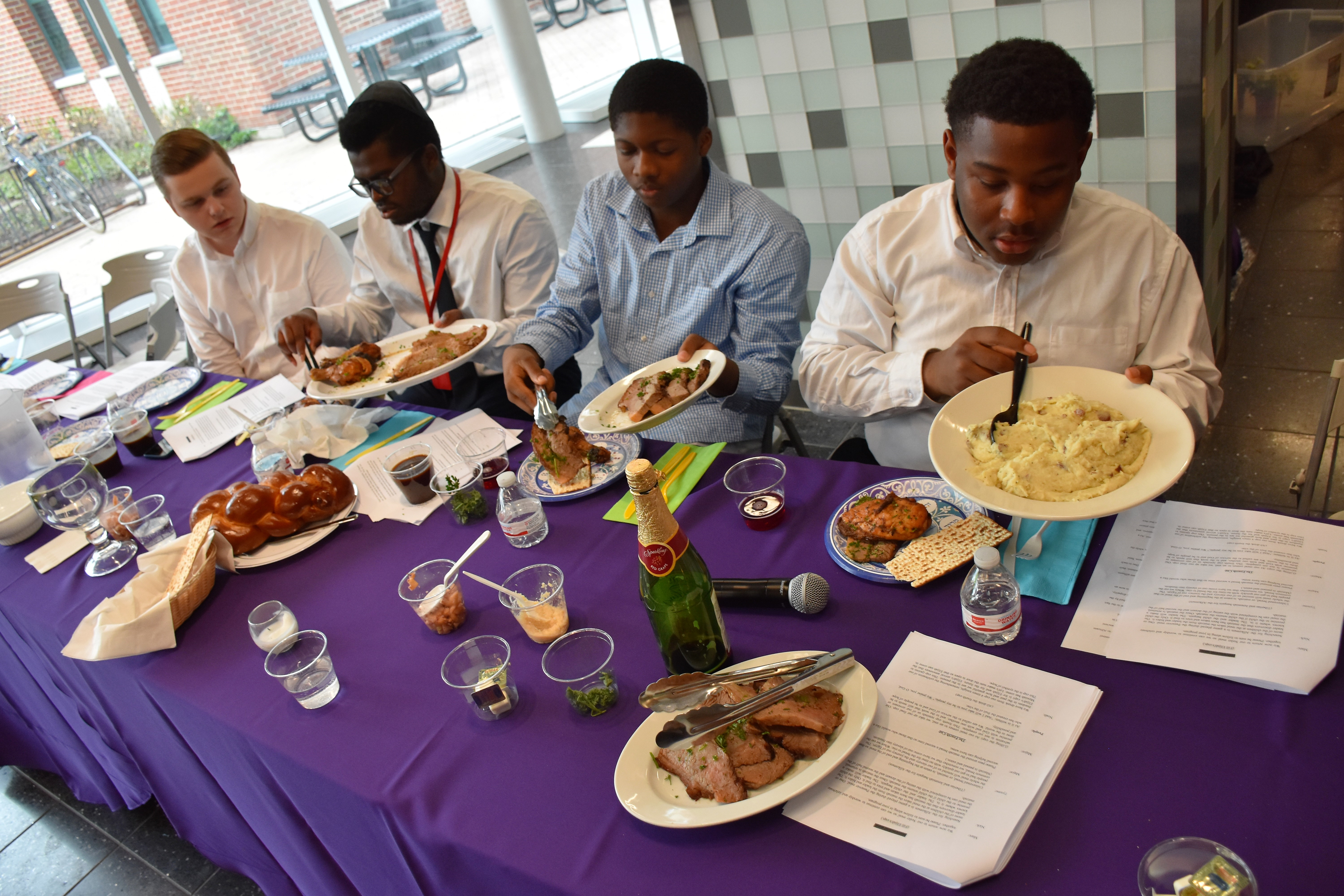 Mercy Home kids participating in a Seder Meal