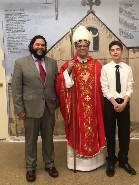 Marc with priest and youth