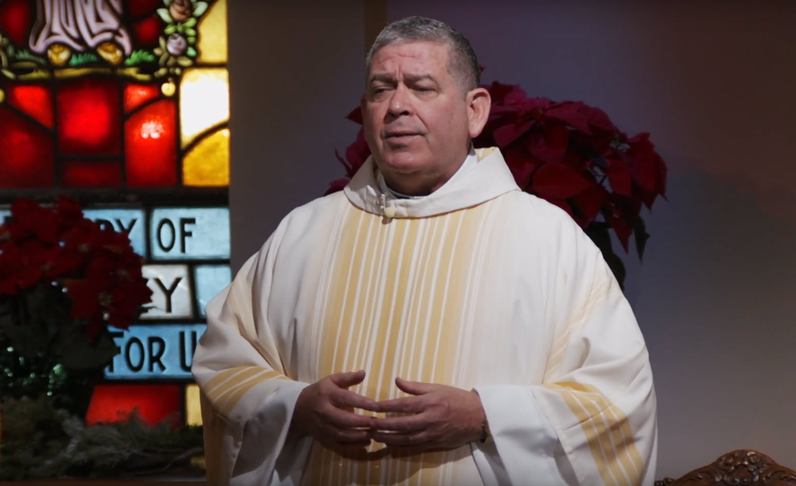 Fr. Scott Donahue leading Christmas Mass