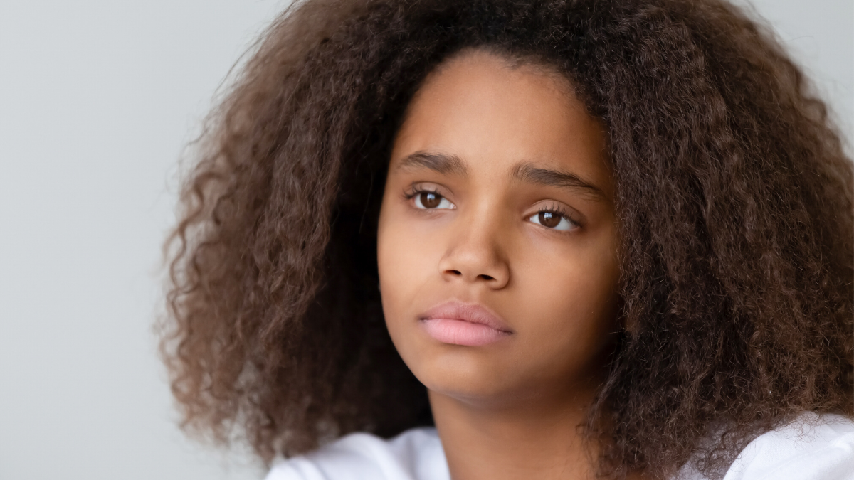 Young girl looking off into the distance