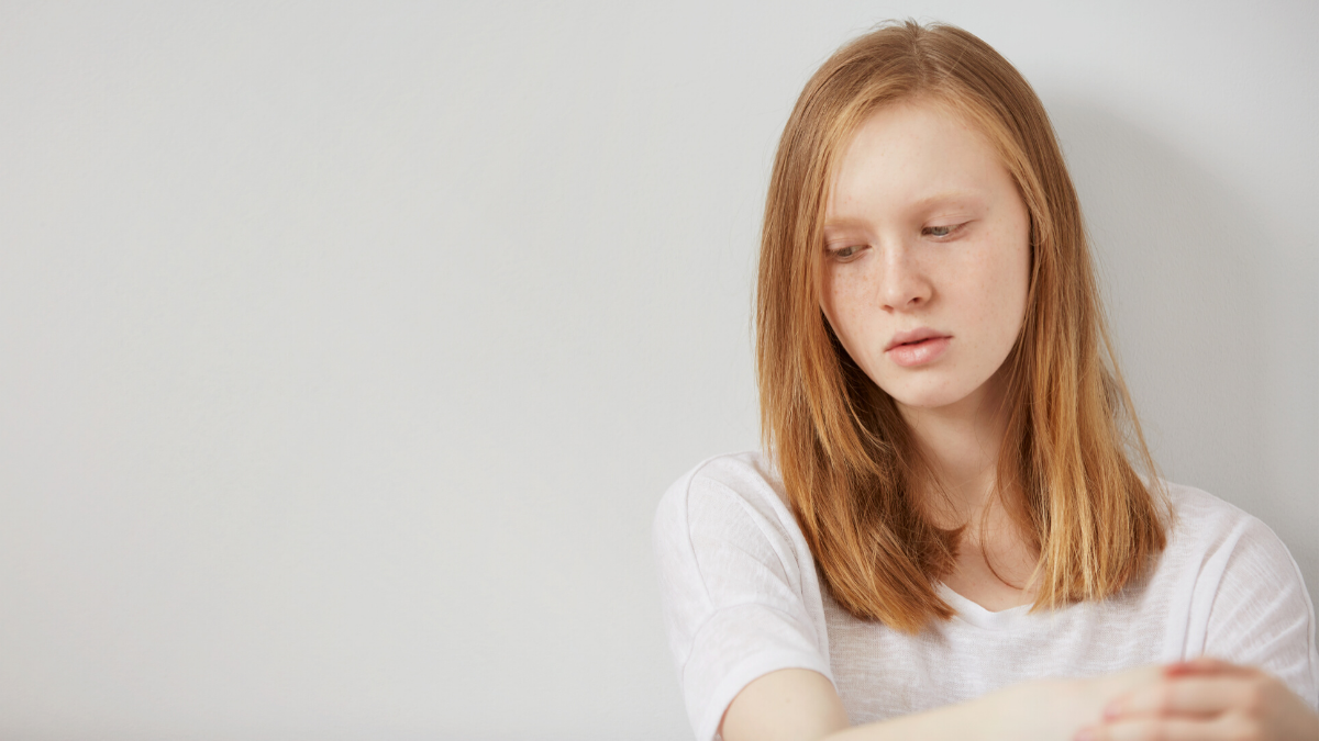 Young girl looking down