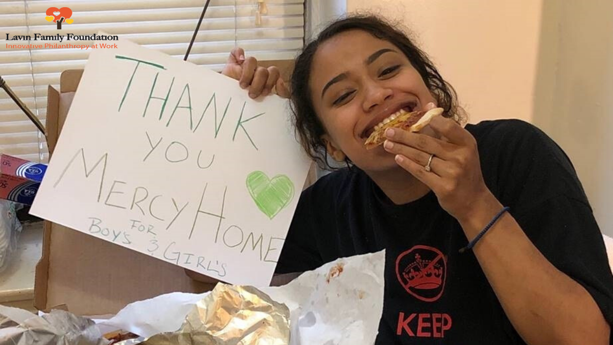 young girl with thank you note