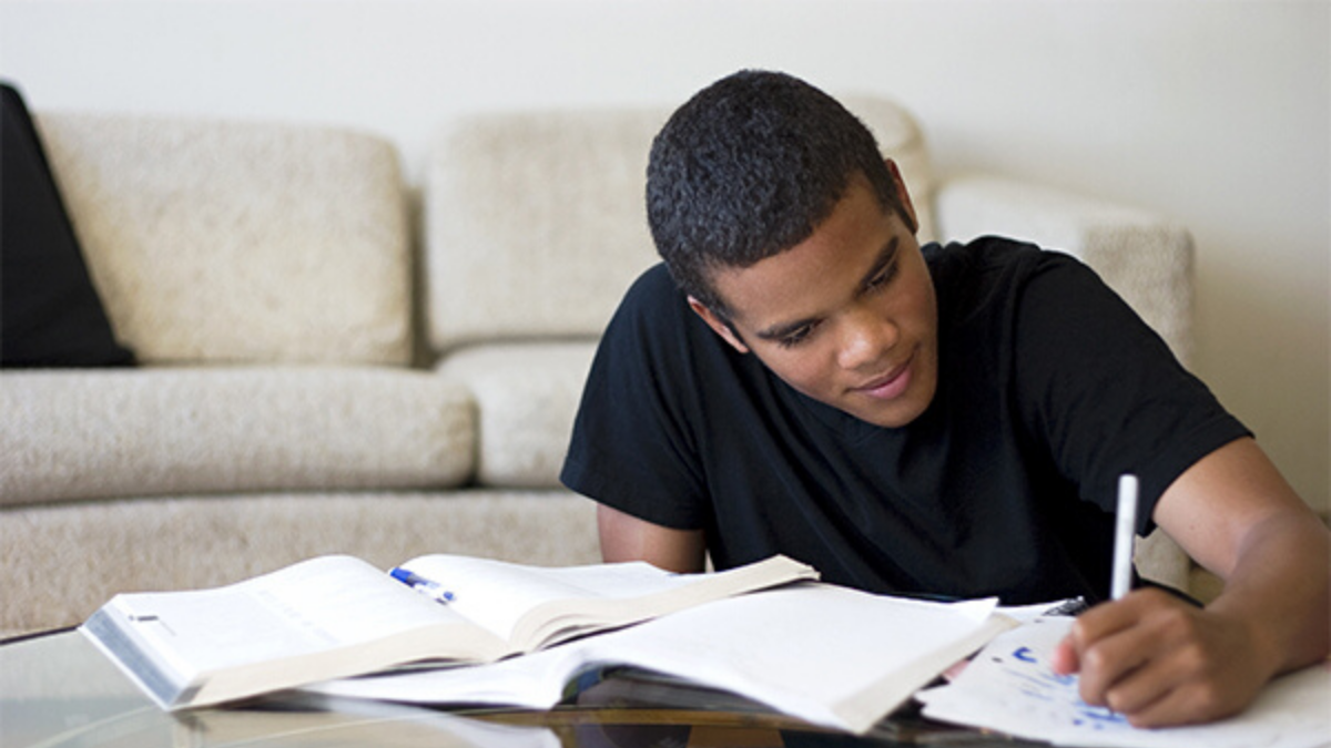 young boy doing homework