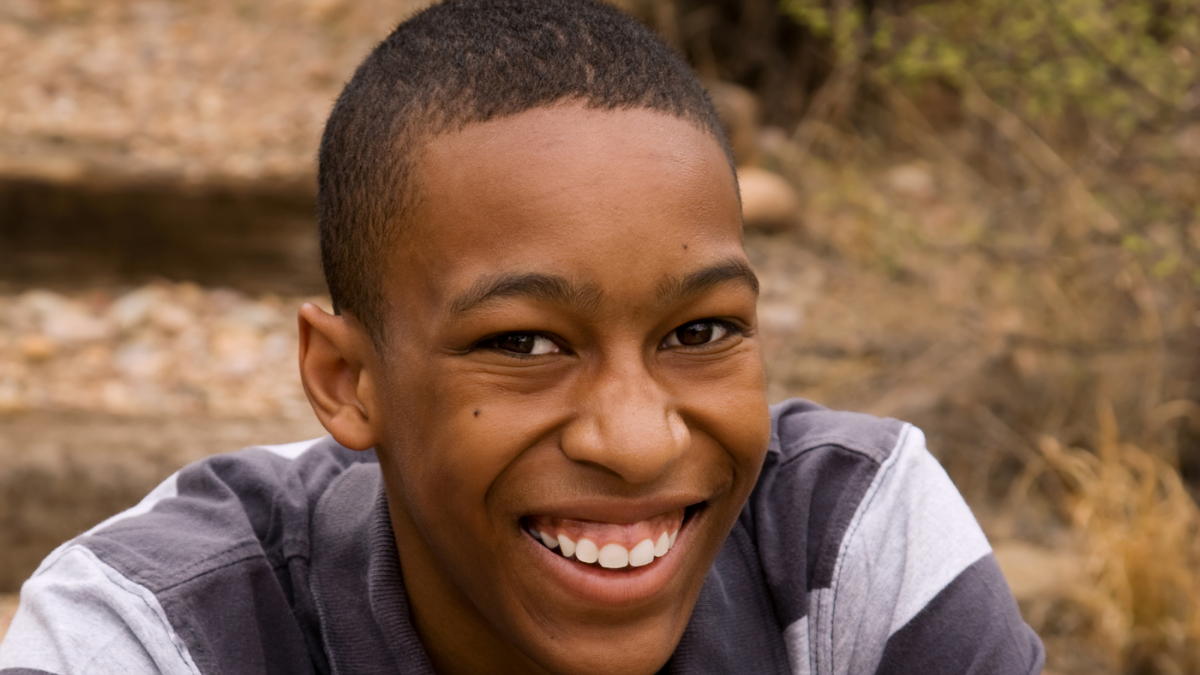 young boy smiling