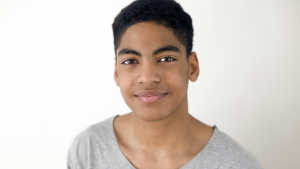 young boy smiling at camera