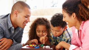 Family playing a board game