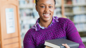 Girl carrying books