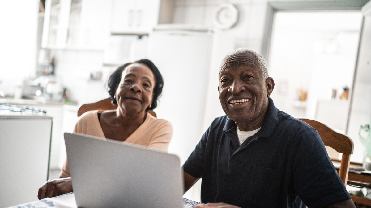 couple looks at computer