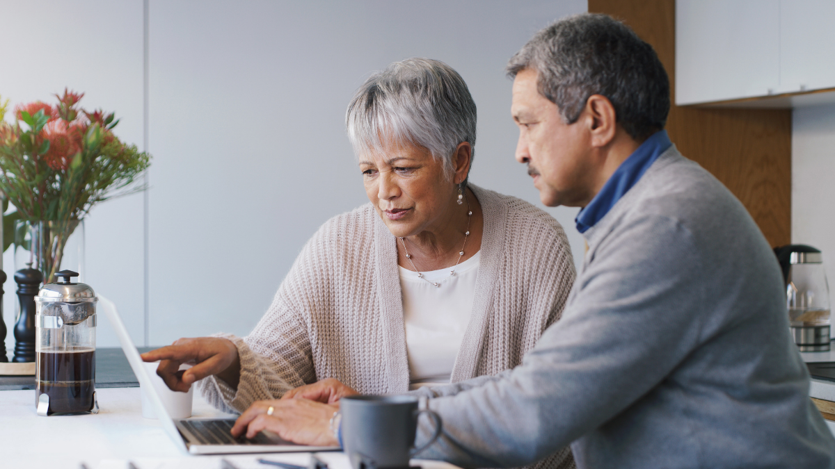 Couple looks at computer