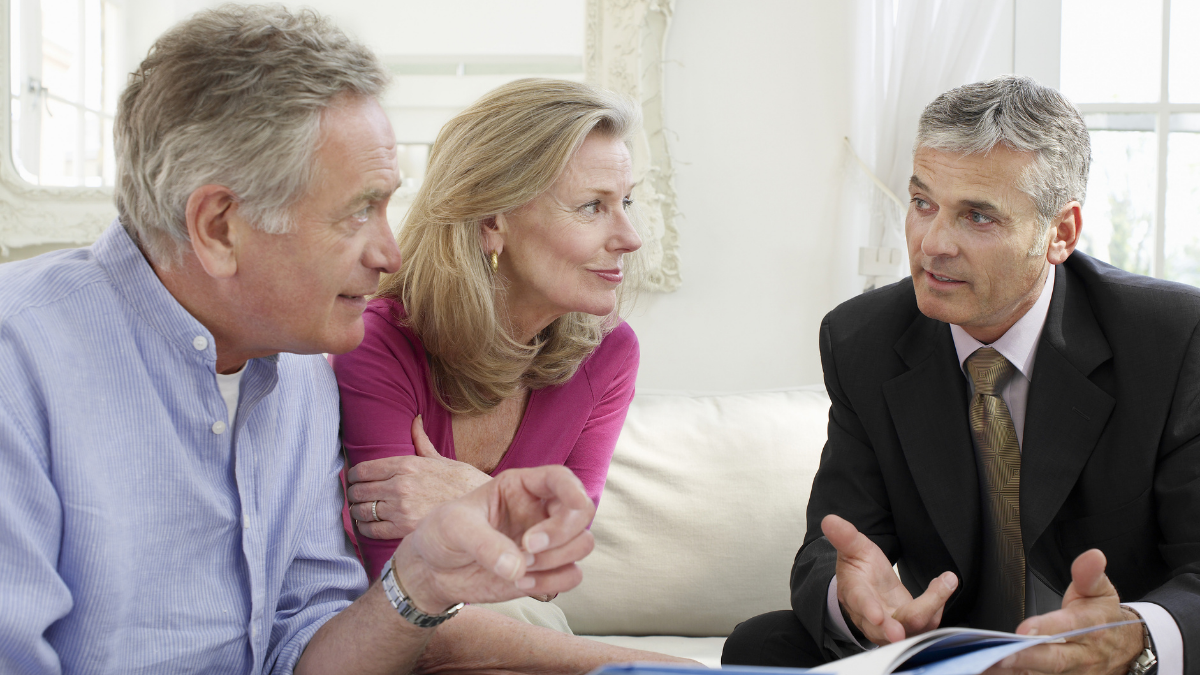 couple meets with Mercy Home coworker