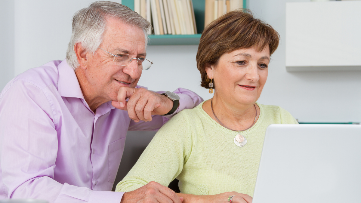 Couple looks at computer