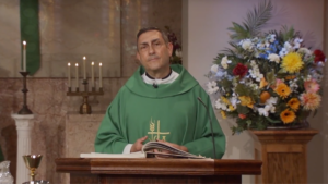 Fr. Carlo Morello preaching