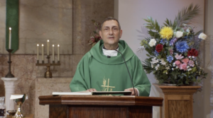 Fr. Carl Morello preaching