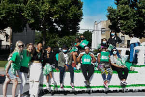 Mercy Home youth and coworkers on their Bud Billiken float