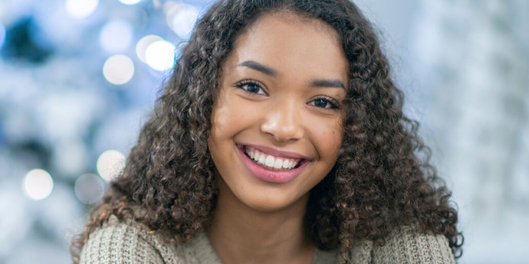 Bright student Jada smiles after finding joy and stability again.