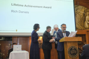 Rich Daniels receives the Lifetime Achievement award from the archdiosese