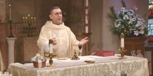 Fr. Carl Morello leads the Sunday Mass community at MErcy Home in celebration of the ixth Sunday of Easter on May 14, 2023.