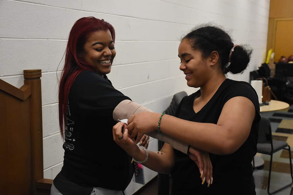 two young women smiling