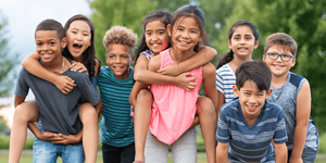 group of young children smiling