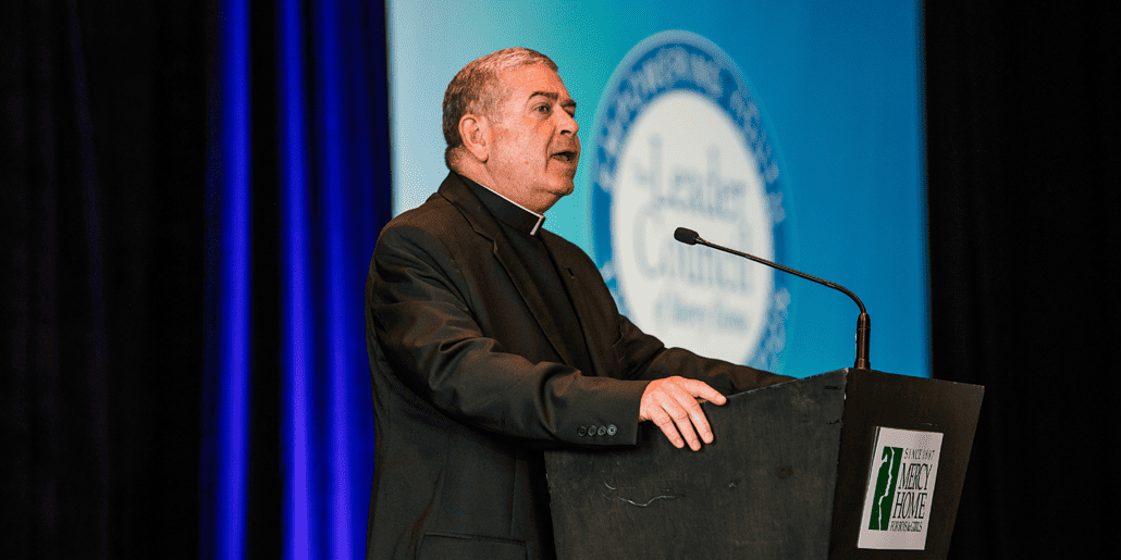 Fr. Scott gives the invocation to kick off a wonderful lunch to celebrate the success of the students at Mercy Home.