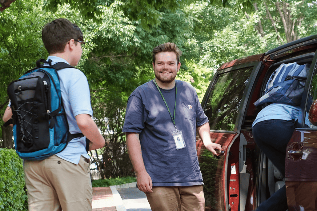 Everyone is loading into the van to head to school.