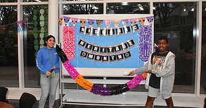 Youth and coworkers celebrate Latine Heritage Month.