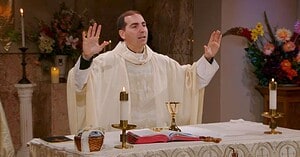 Fr. James Wallace celebrates Sunday Mass at Mercy Home for Boys & Girls on The Most Holy Body and Blood of Christ.